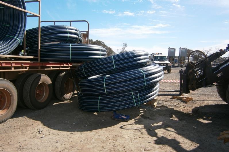 Position of poly pipe after the incident. The forklift and hydraulic jacks were used to move the poly pipe to access the underground operator trapped beneath.