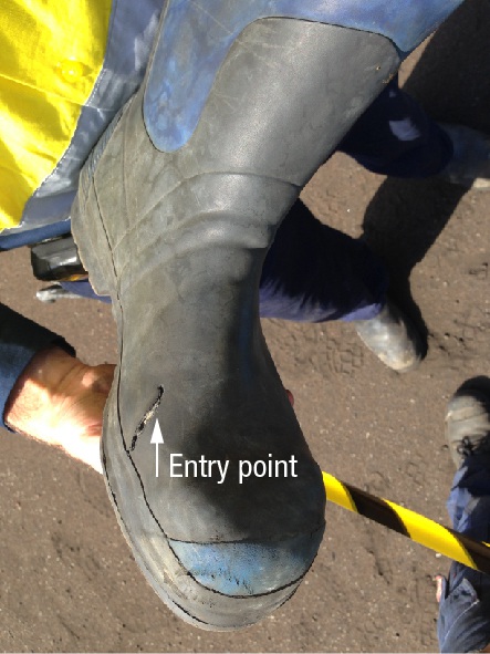 Entry point where high-pressure water jet penetrated boot lining