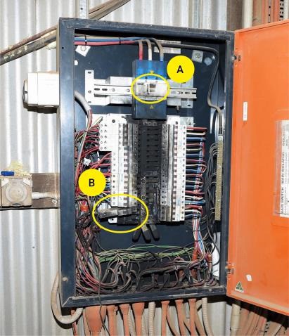 Arc flash damage to the low voltage switchboard showing the isolator in the “On” position (A) and the circuit breaker that was to be removed (B)