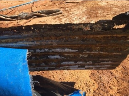 Corroded steel wall of tank