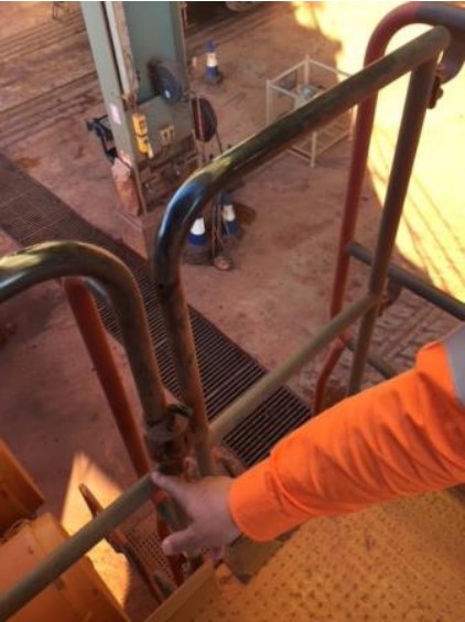 Near miss when latch fails and gate swings open on a haul truck