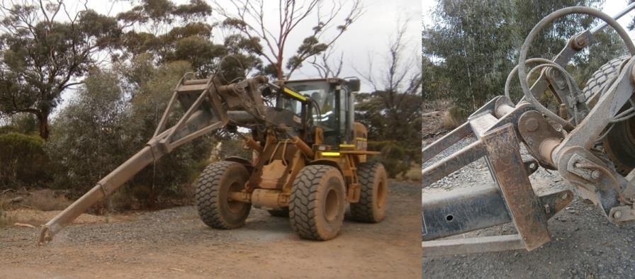 Left: IT with jib angled down. Right: Jib attachment with locking pins not engaged.