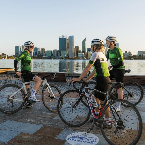 Image of riders by the river